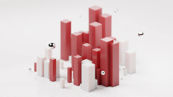 a group of red and white objects on a white surface