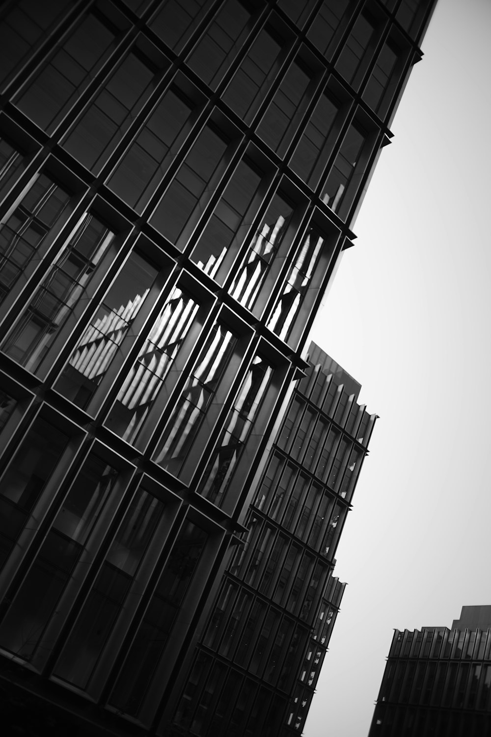 a black and white photo of a tall building