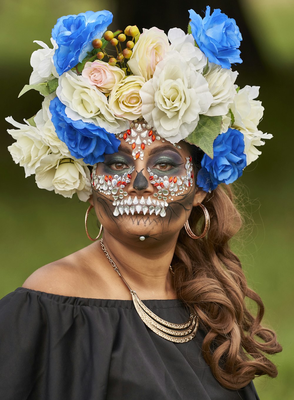 a woman with makeup and flowers in her hair