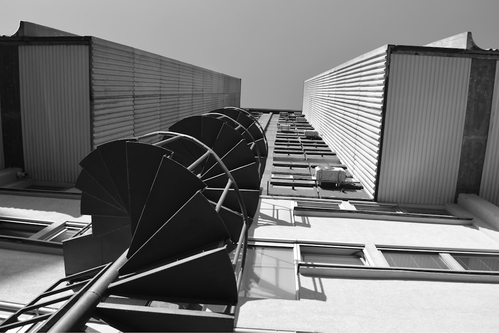 a black and white photo of a satellite dish