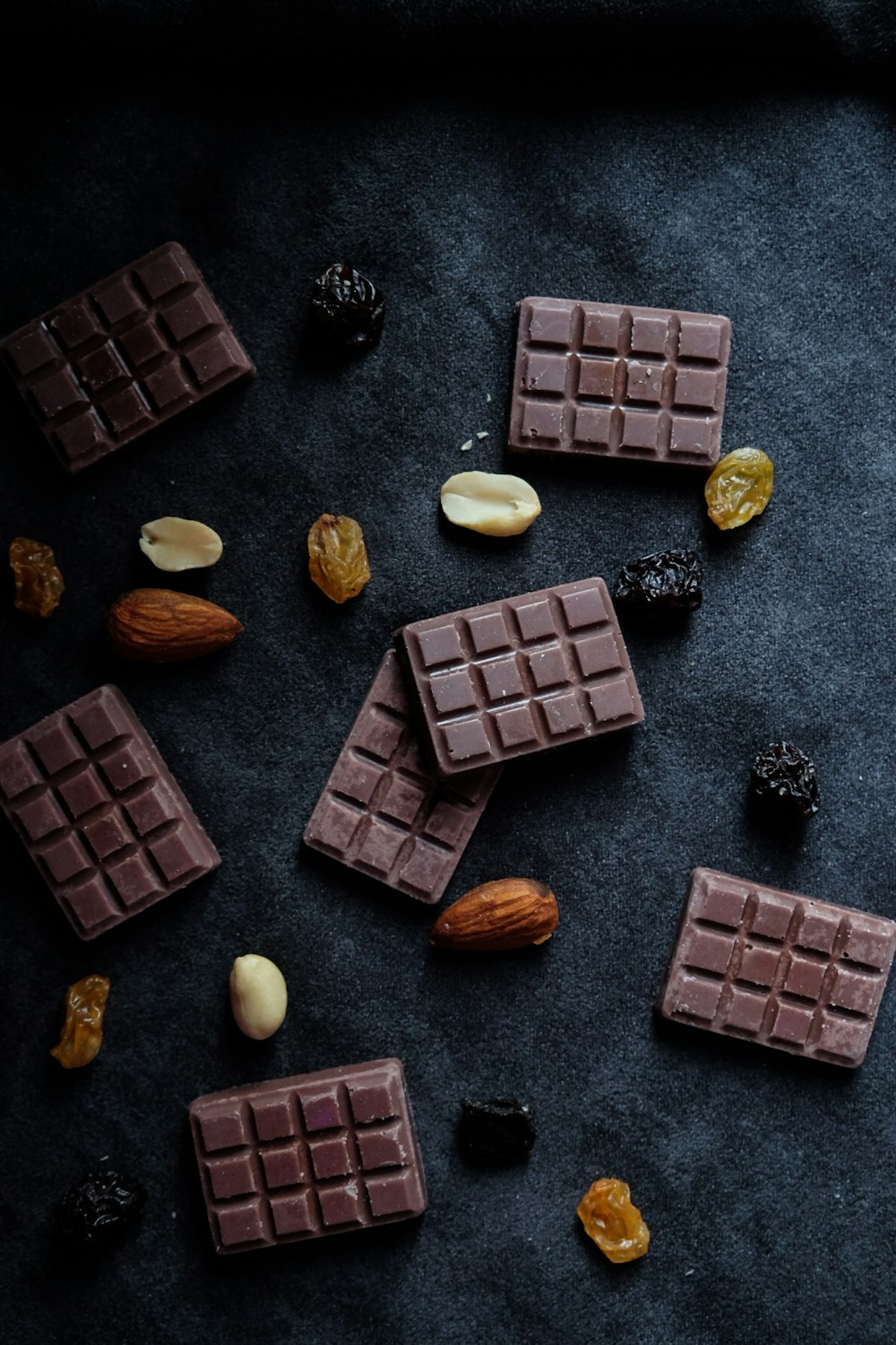 a table topped with chocolate and nuts