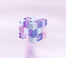 a stylized image of a cube with many smaller cubes