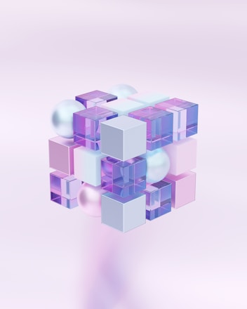 a stylized image of a cube with many smaller cubes