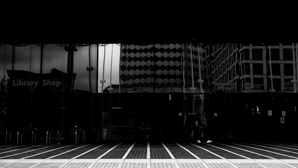 a black and white photo of a library shop