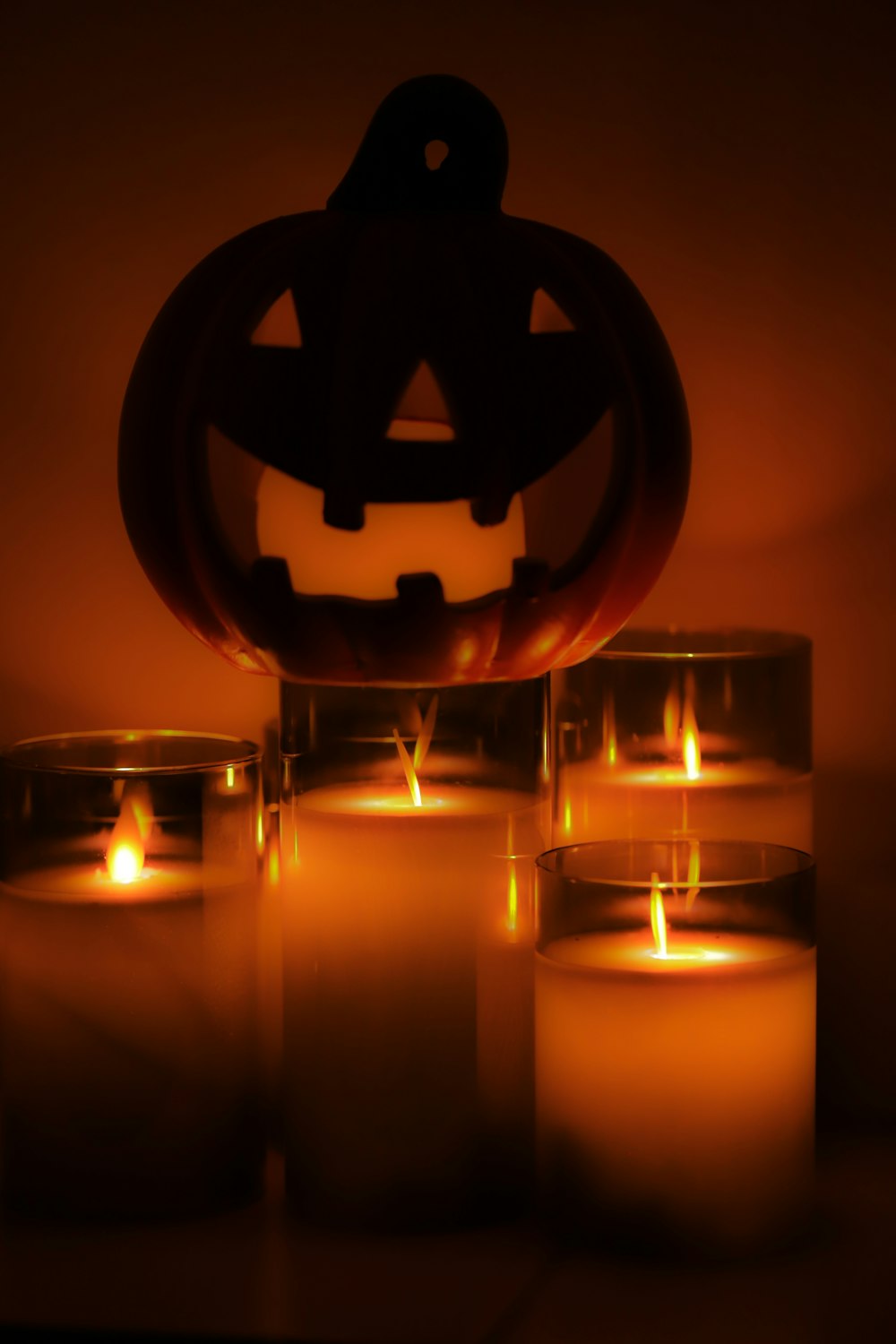 a group of lit candles sitting next to each other