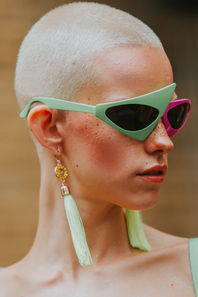 a close up of a person wearing sunglasses