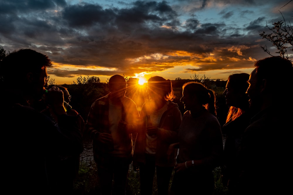 a group of people standing next to each other