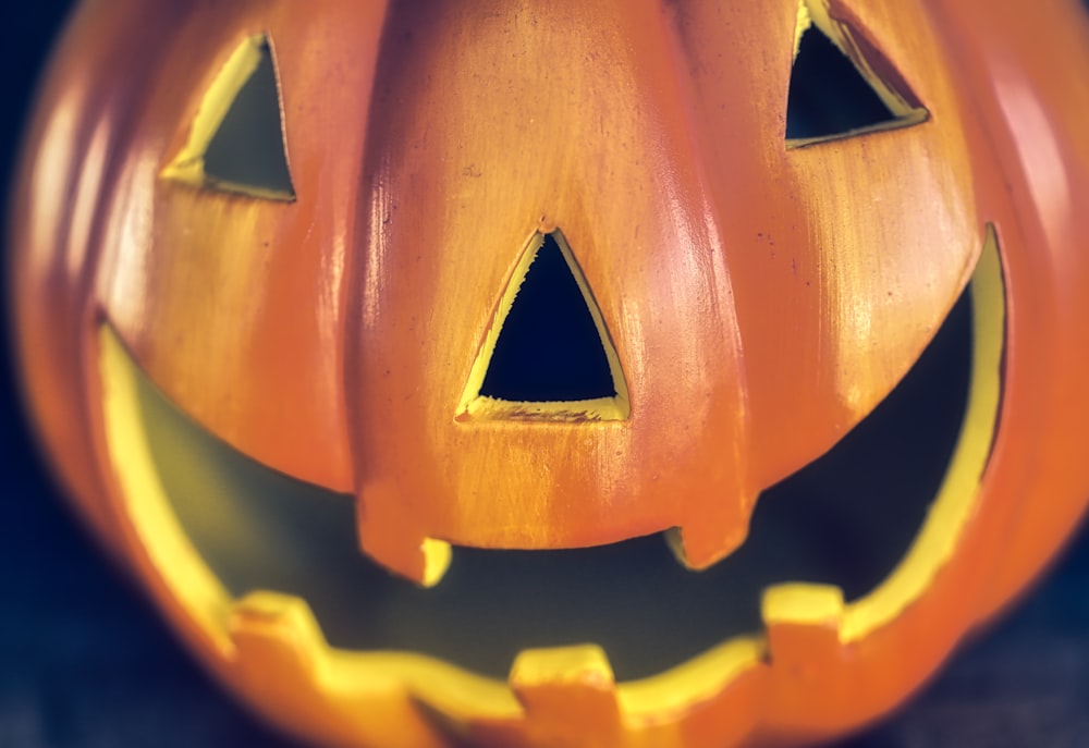 a close up of a carved pumpkin