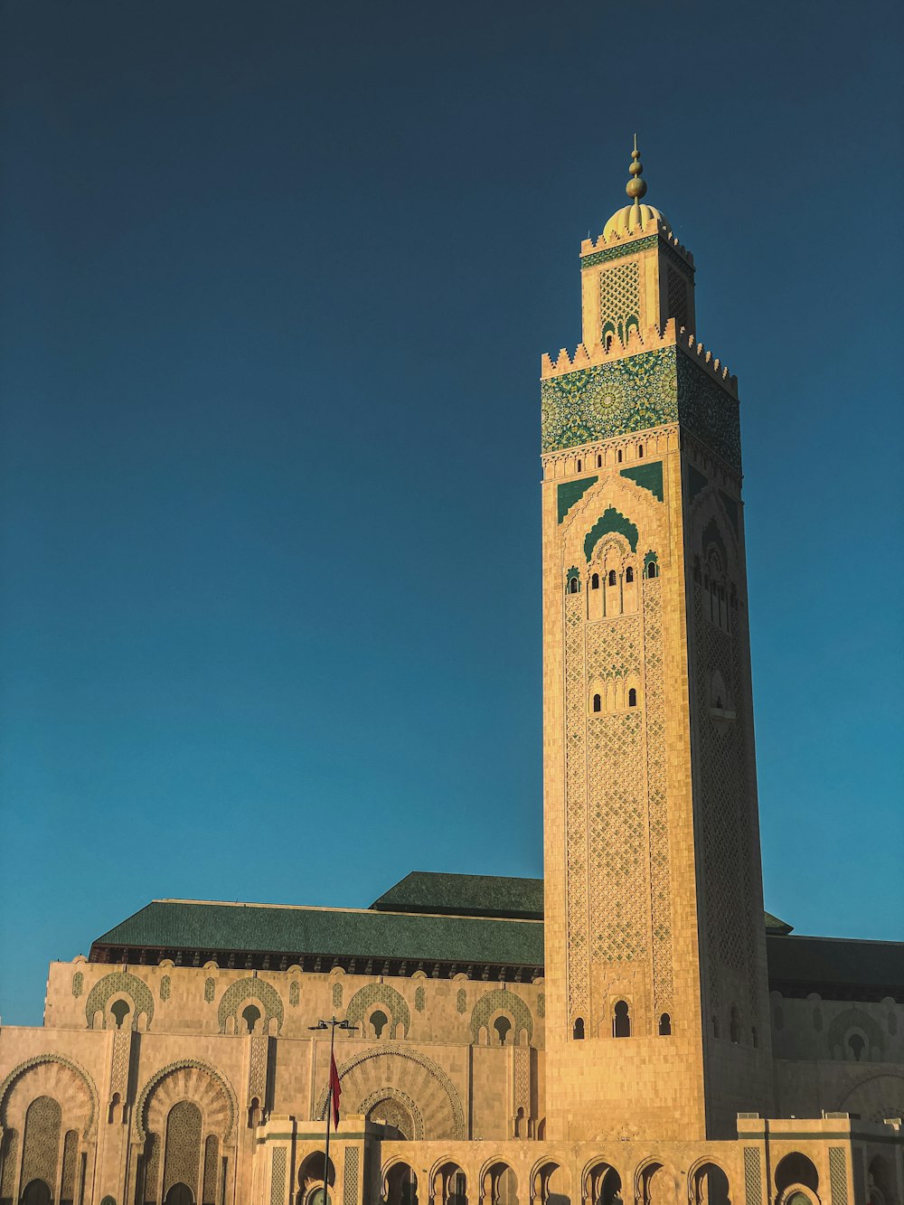 a tall clock tower towering over a city