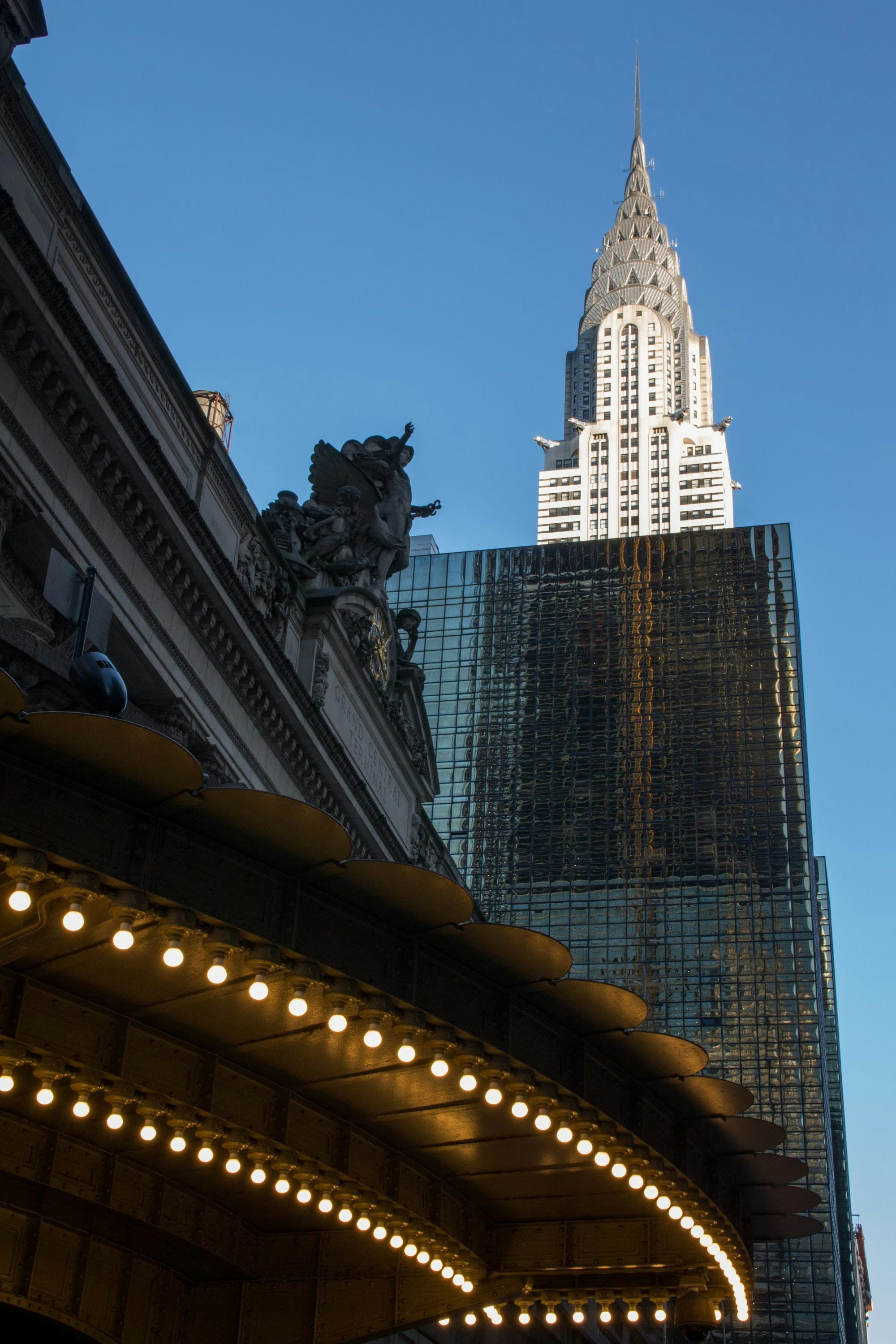 a tall building with a clock on the front of it