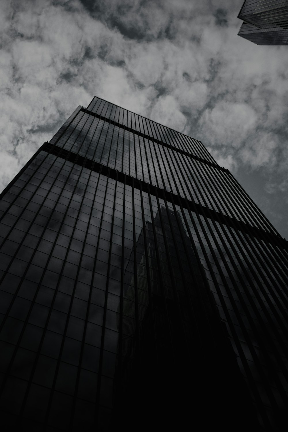 a black and white photo of a tall building