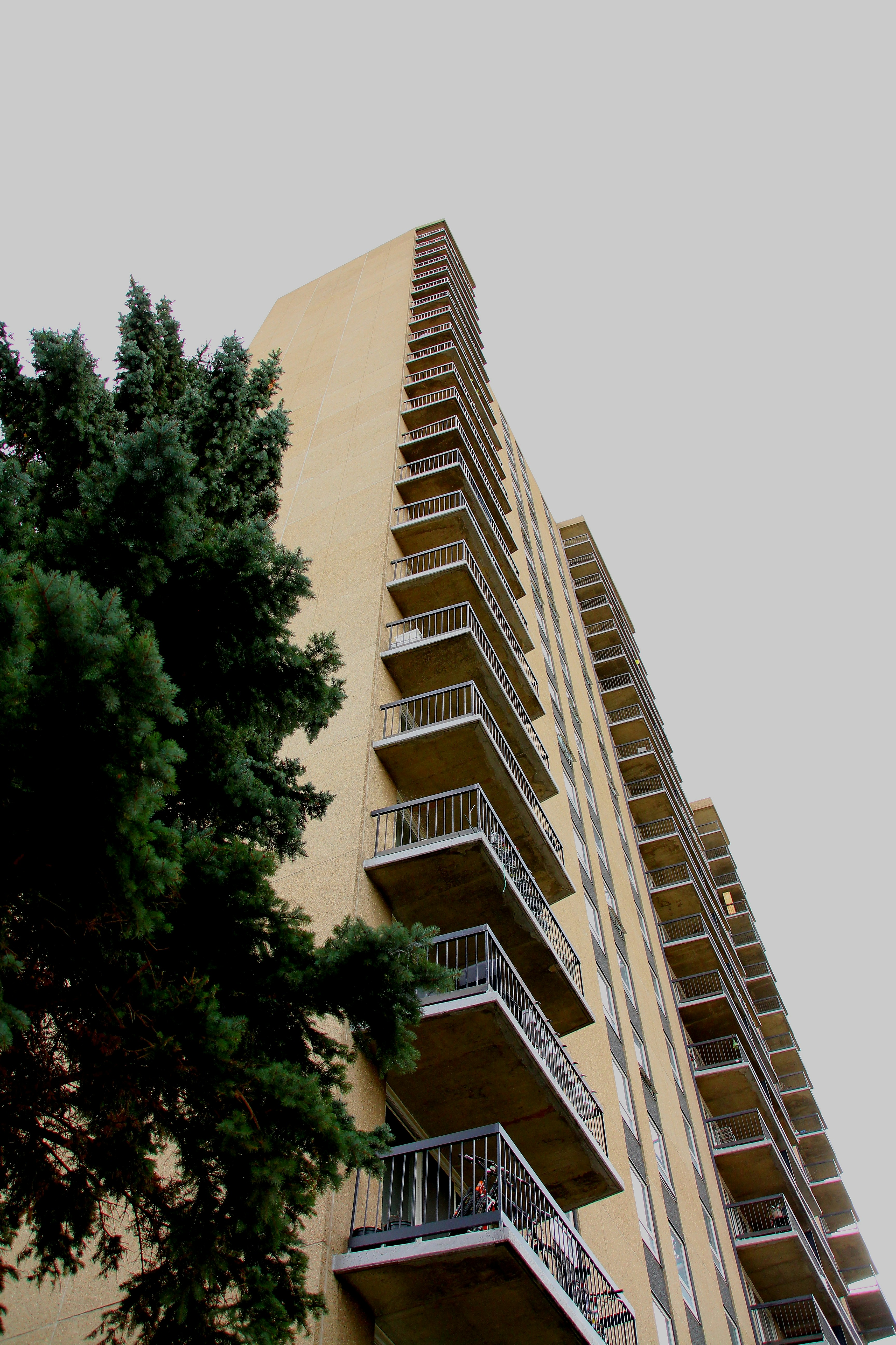 a tall building with balconies and balconies on the balconies