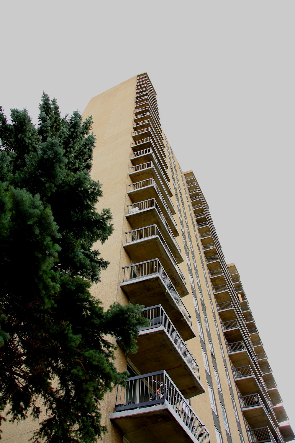 a tall building with balconies and balconies on the balconies