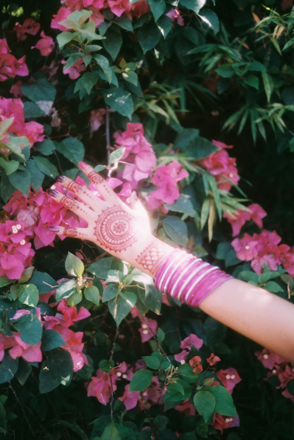 a woman's hand with a henna on it