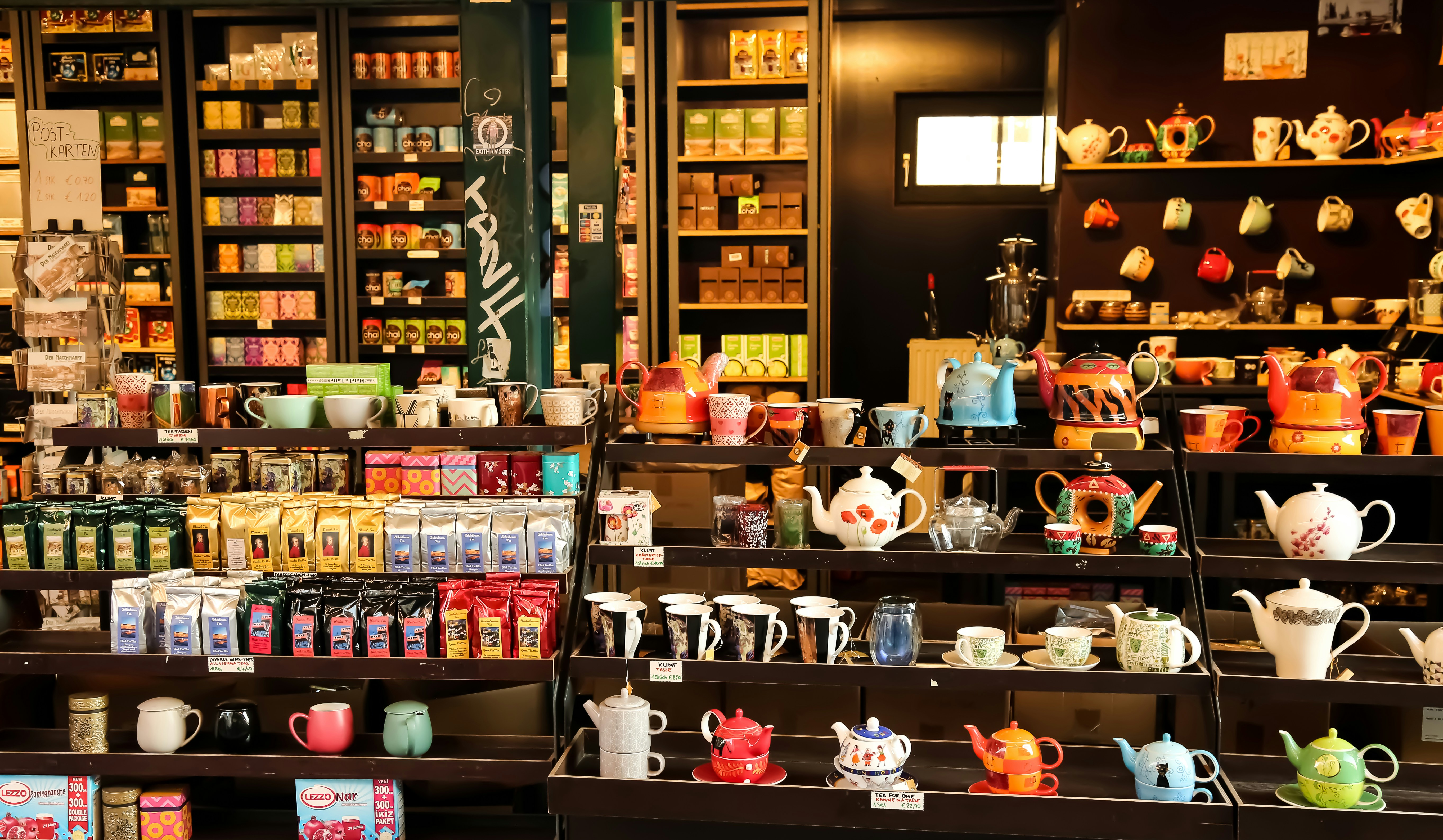 a store filled with lots of different types of tea, 