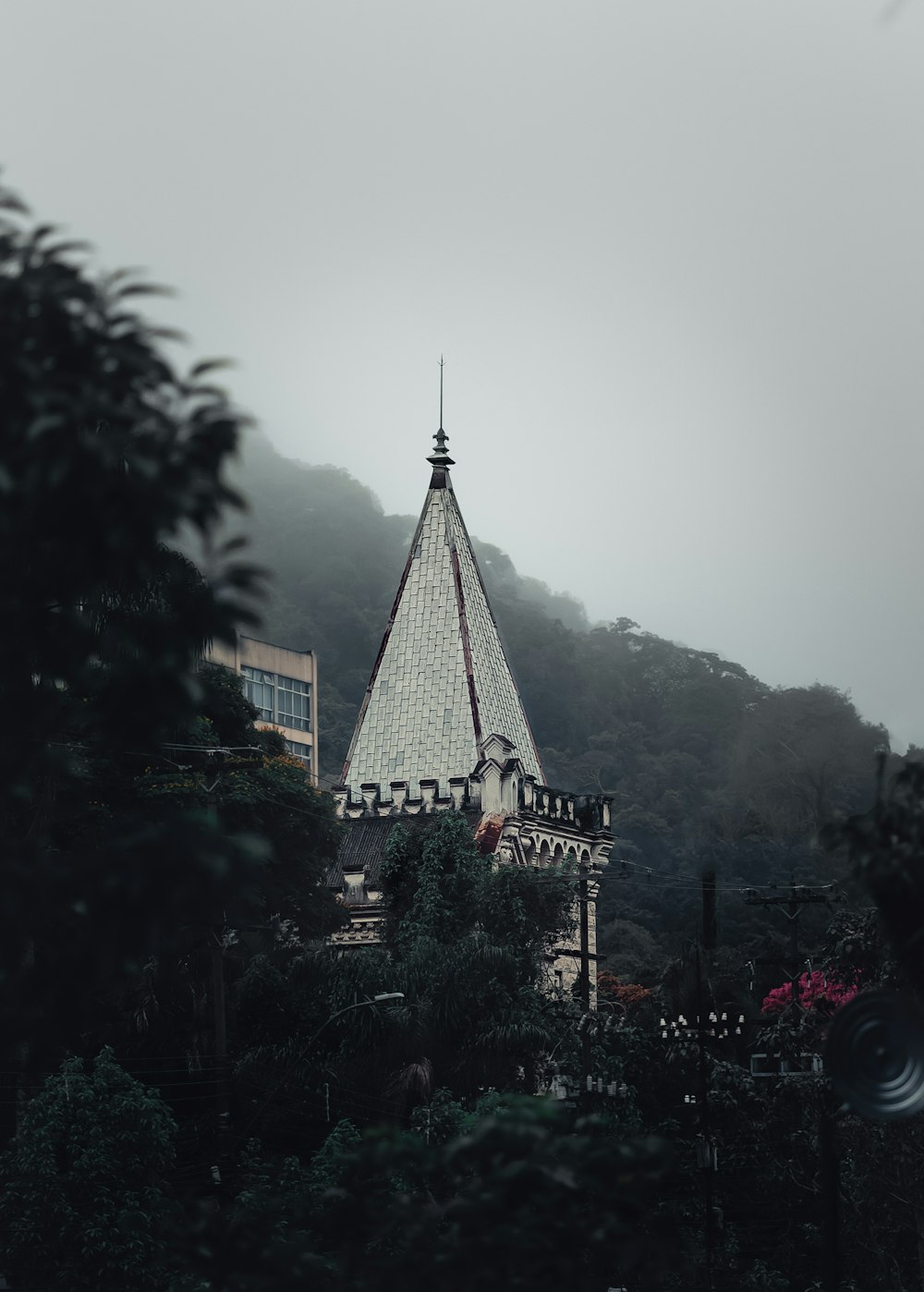 a very tall building with a steeple on top of it