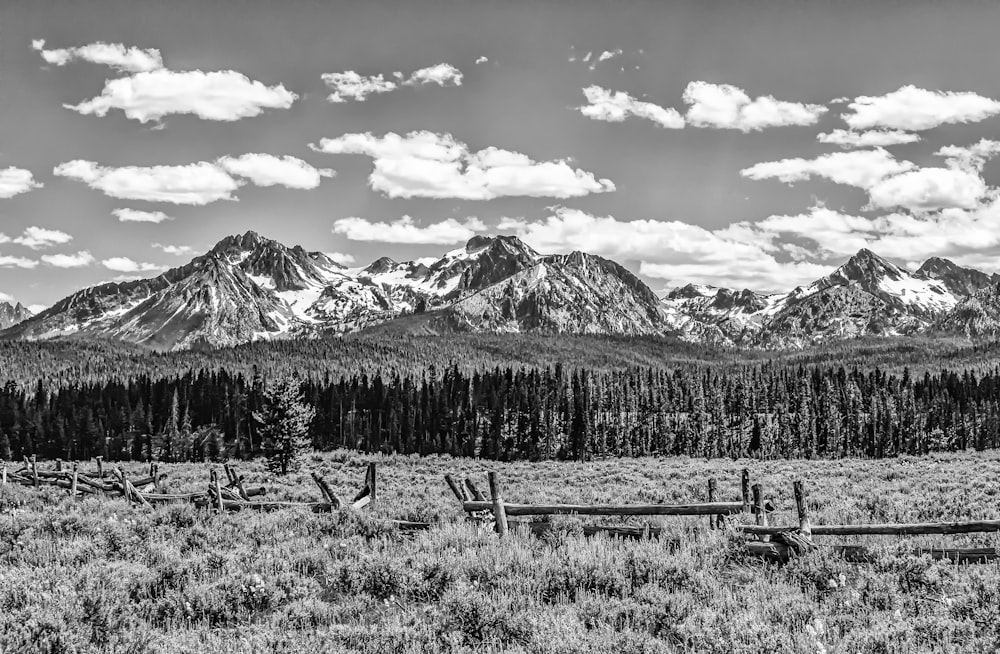 a black and white photo of a mountain range