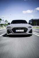 A flying car smoothly navigating above a bustling urban environment, showcasing innovation.