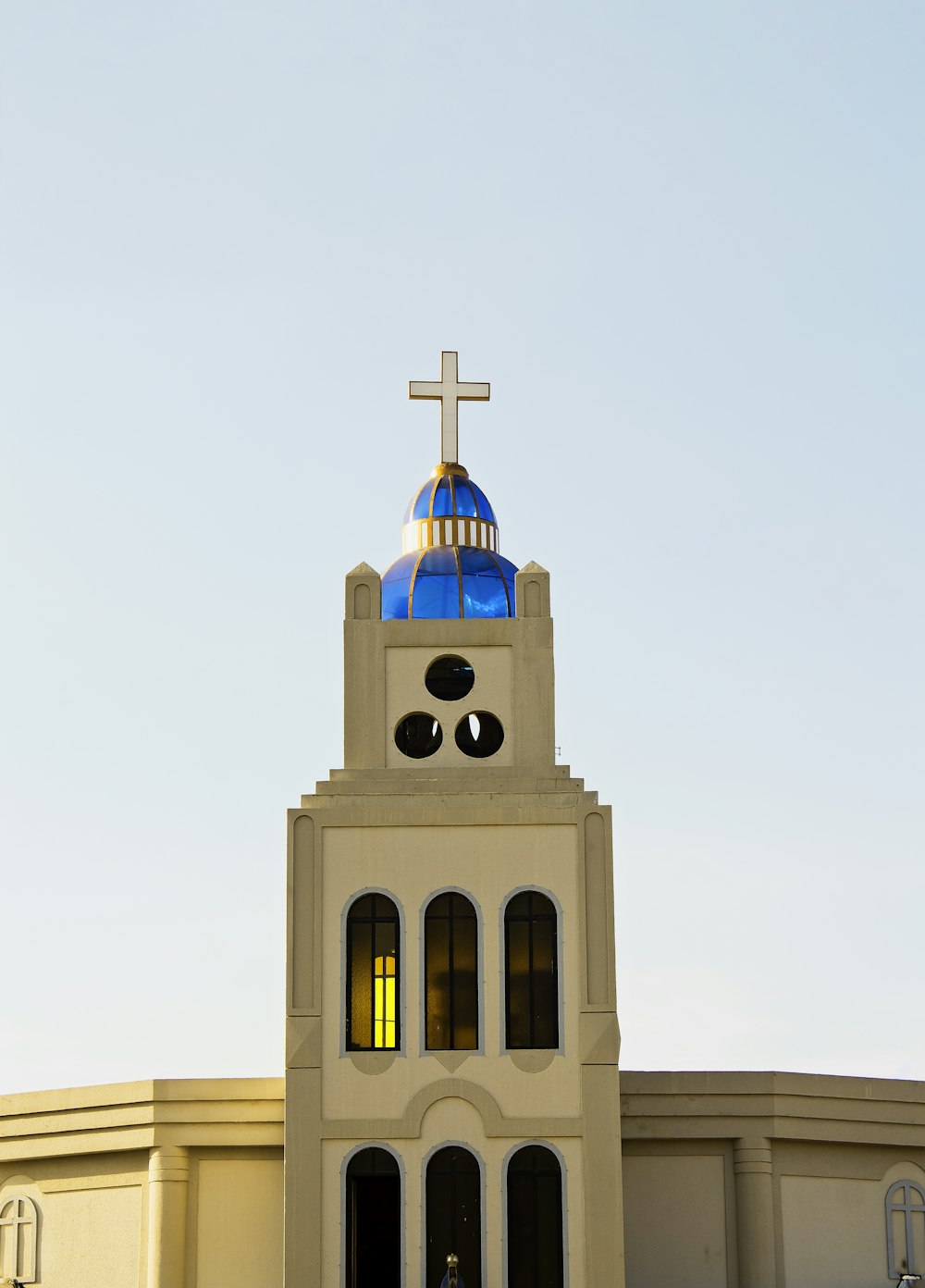 a church with a cross on top of it