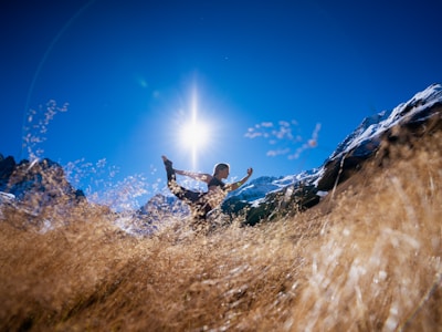 a person riding on top of a mountain