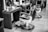 a black and white photo of a barber shop