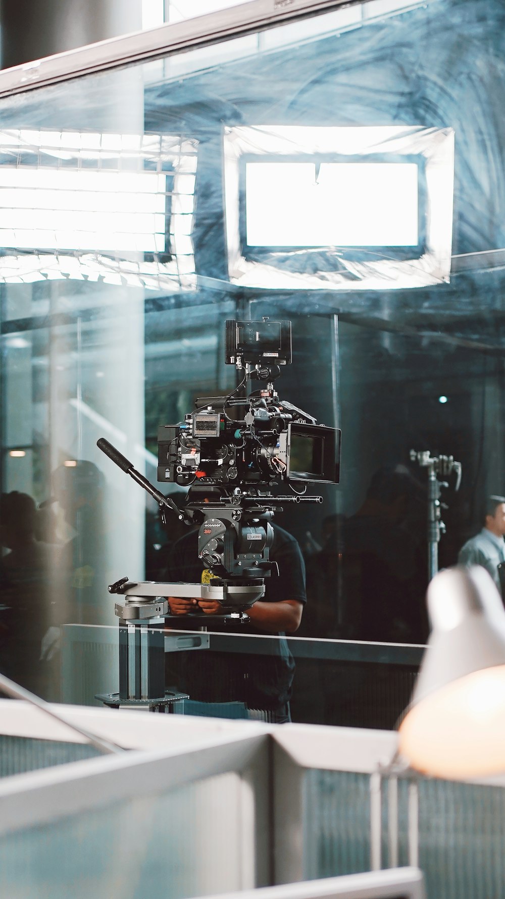 a camera set up in front of a mirror