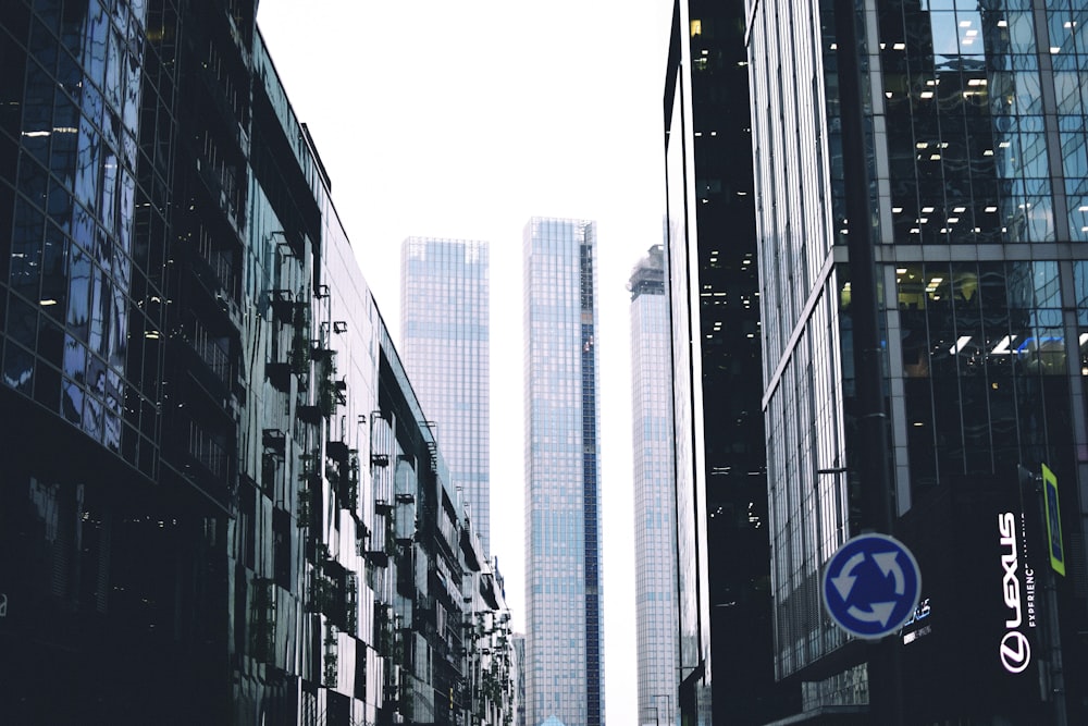 a city street filled with lots of tall buildings