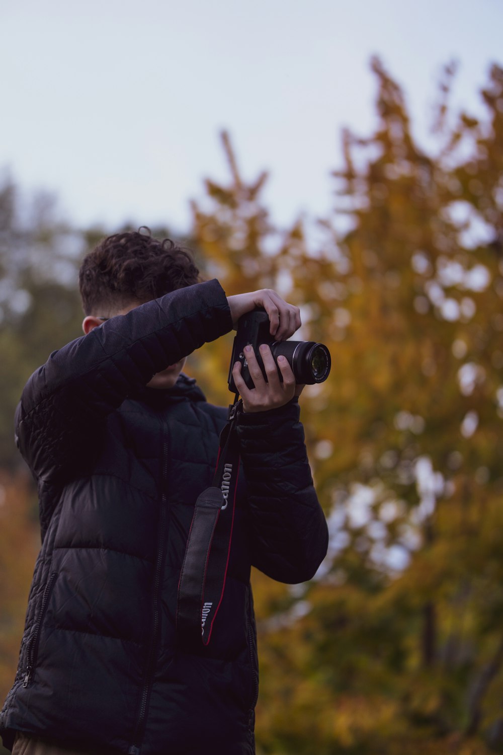 a man taking a picture with a camera