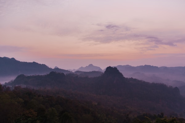 a view of a mountain range at sunset