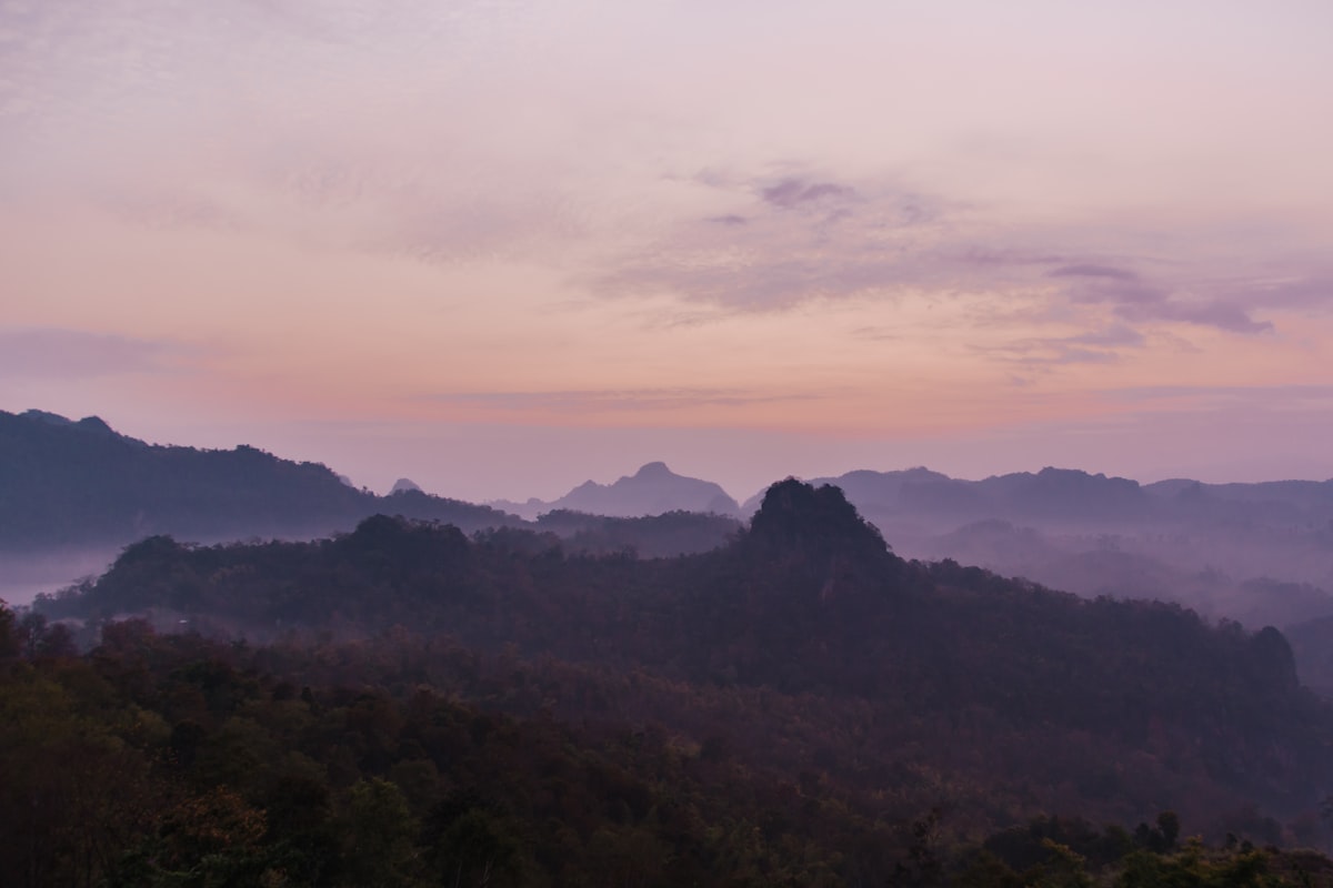 Golden Triangle viewpoint at sunset where the Mekong River marks the borders of Thailand, Laos, and Myanmar