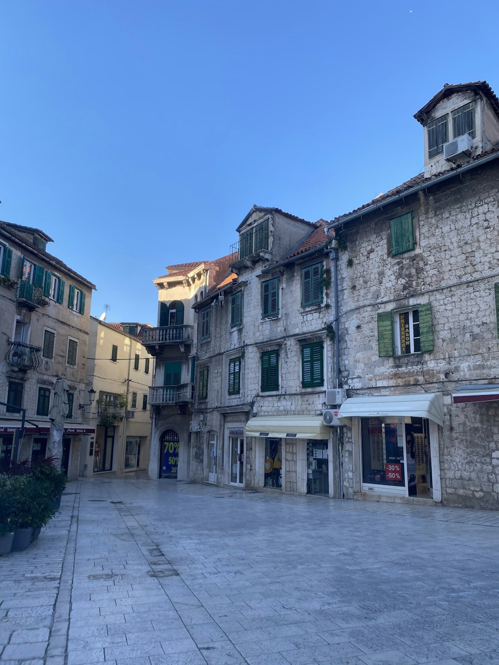 an empty square in an old european town