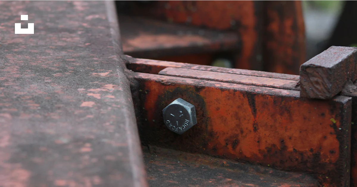 A close up of a rusted metal bench photo – Free Rust Image on Unsplash