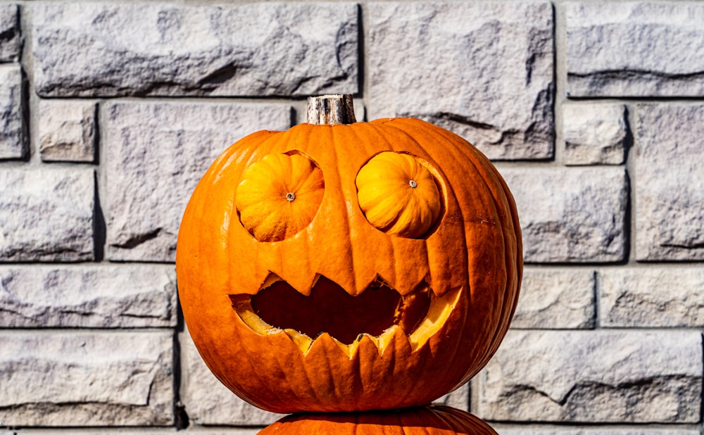 a carved pumpkin sitting on top of a table