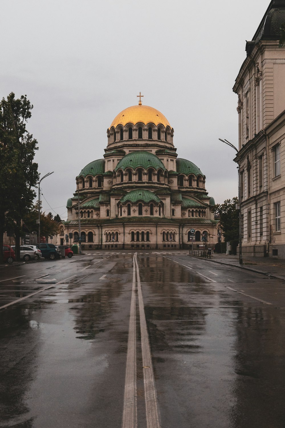 a large building with a yellow dome on top of it