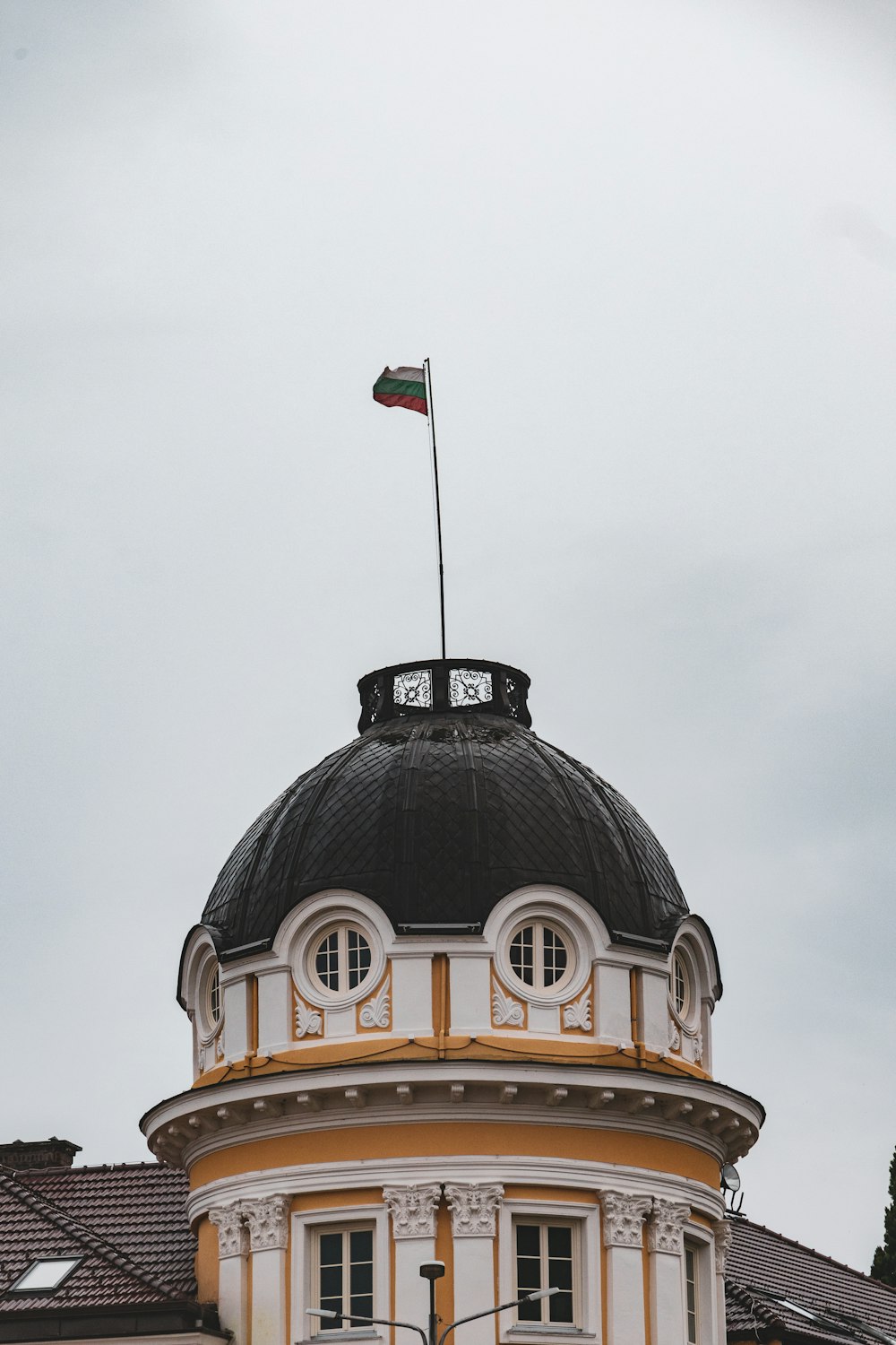 a building with a flag on top of it