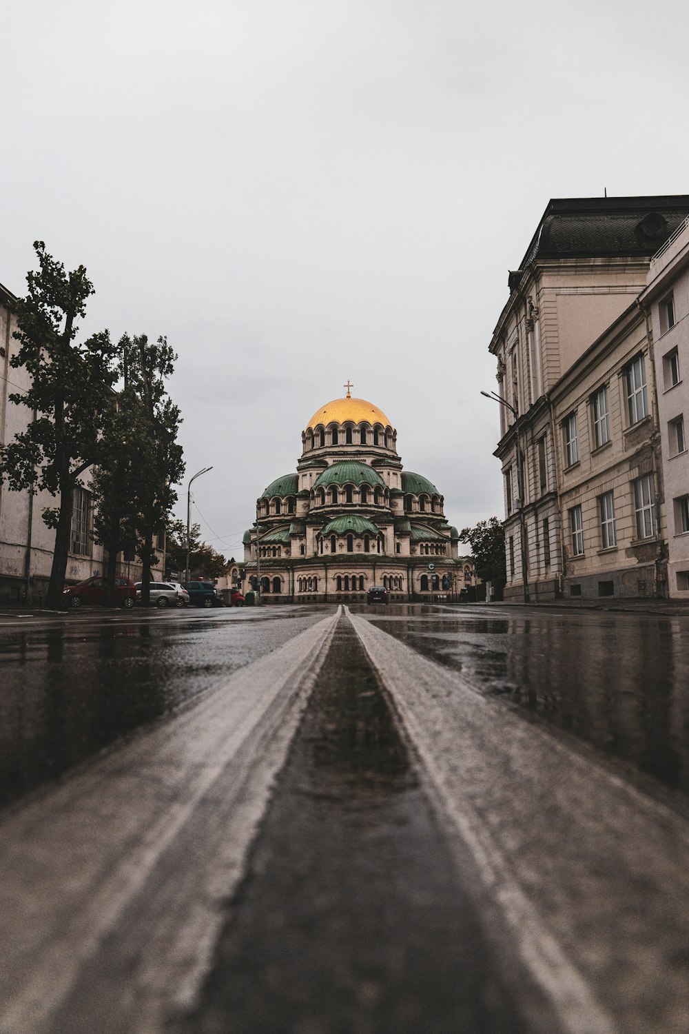 a large building with a yellow dome on top of it