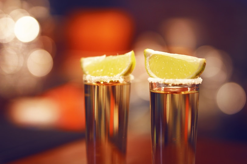 The Choosy Traveller: Tequila vs Mescal two tequila glasses with lemon