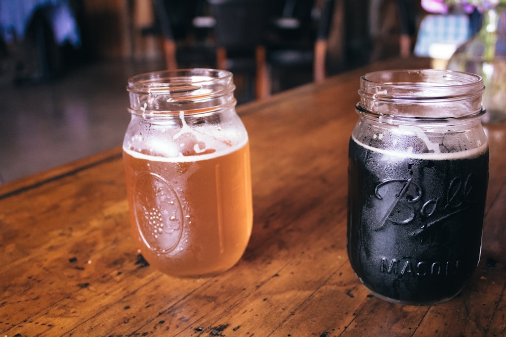 a glass of beer on a table