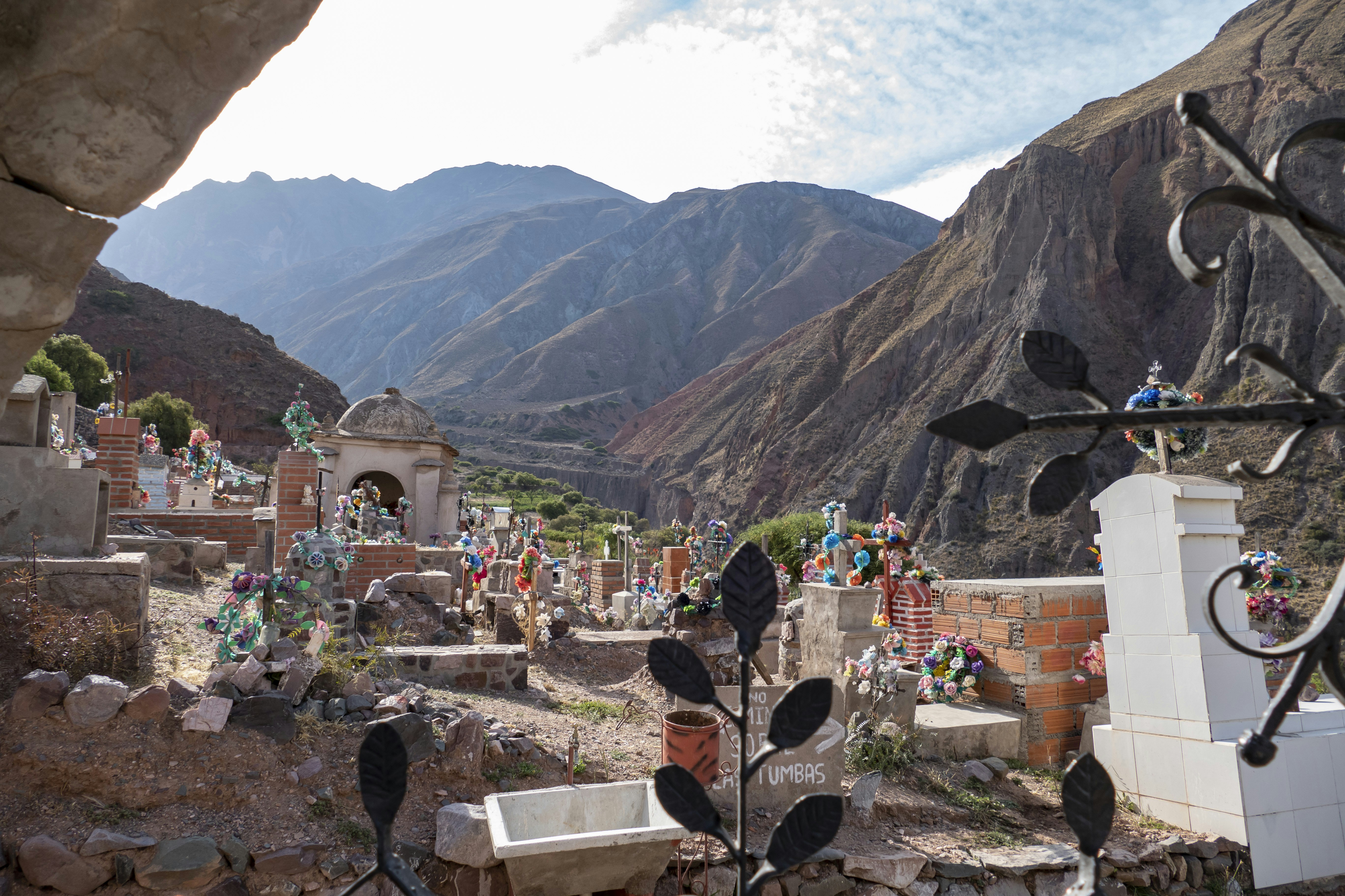 a group of people standing on top of a mountain, 