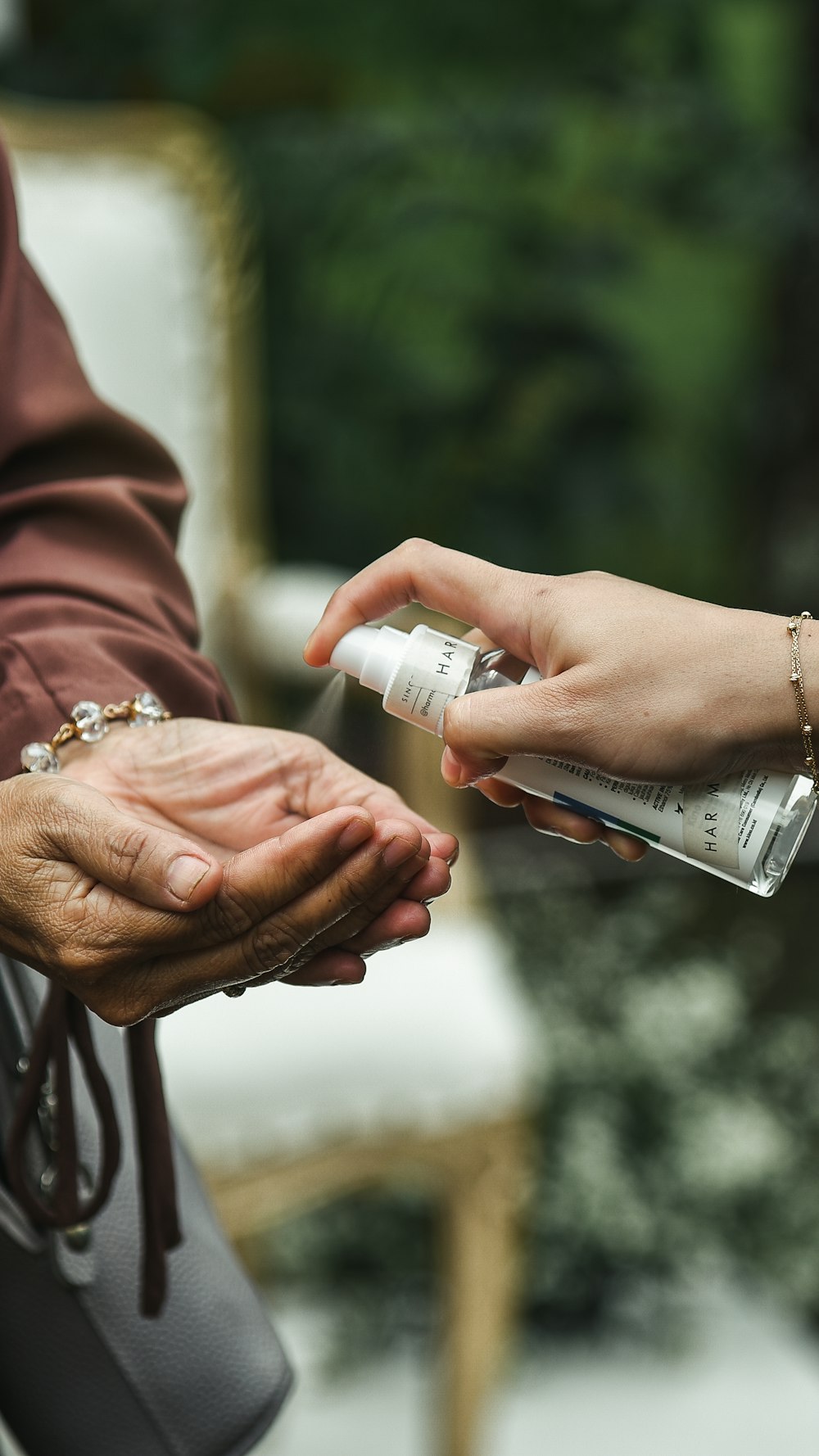 a person handing another person something from a bag