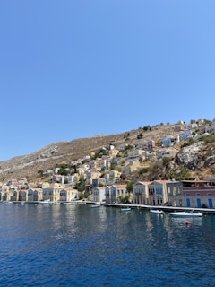 A picturesque coastal village with colorful houses and a serene beach.