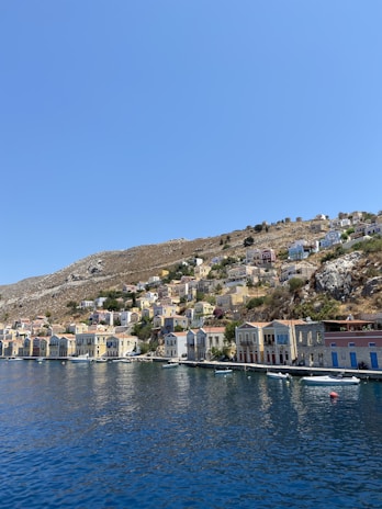 A picturesque coastal village with colorful houses and a serene beach.