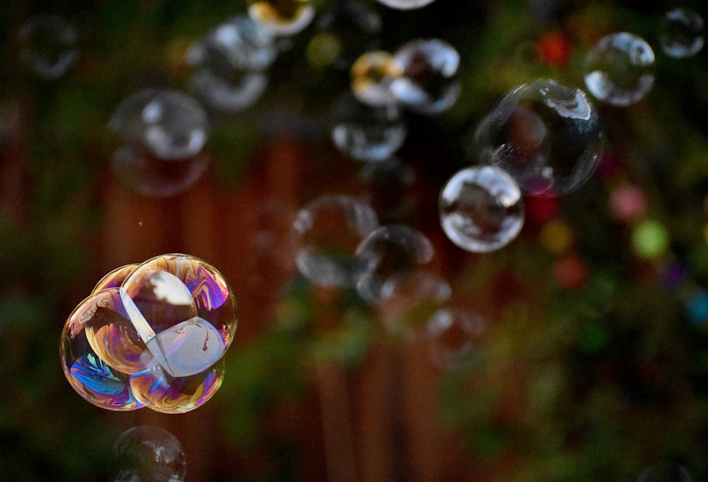 a bunch of soap bubbles floating in the air