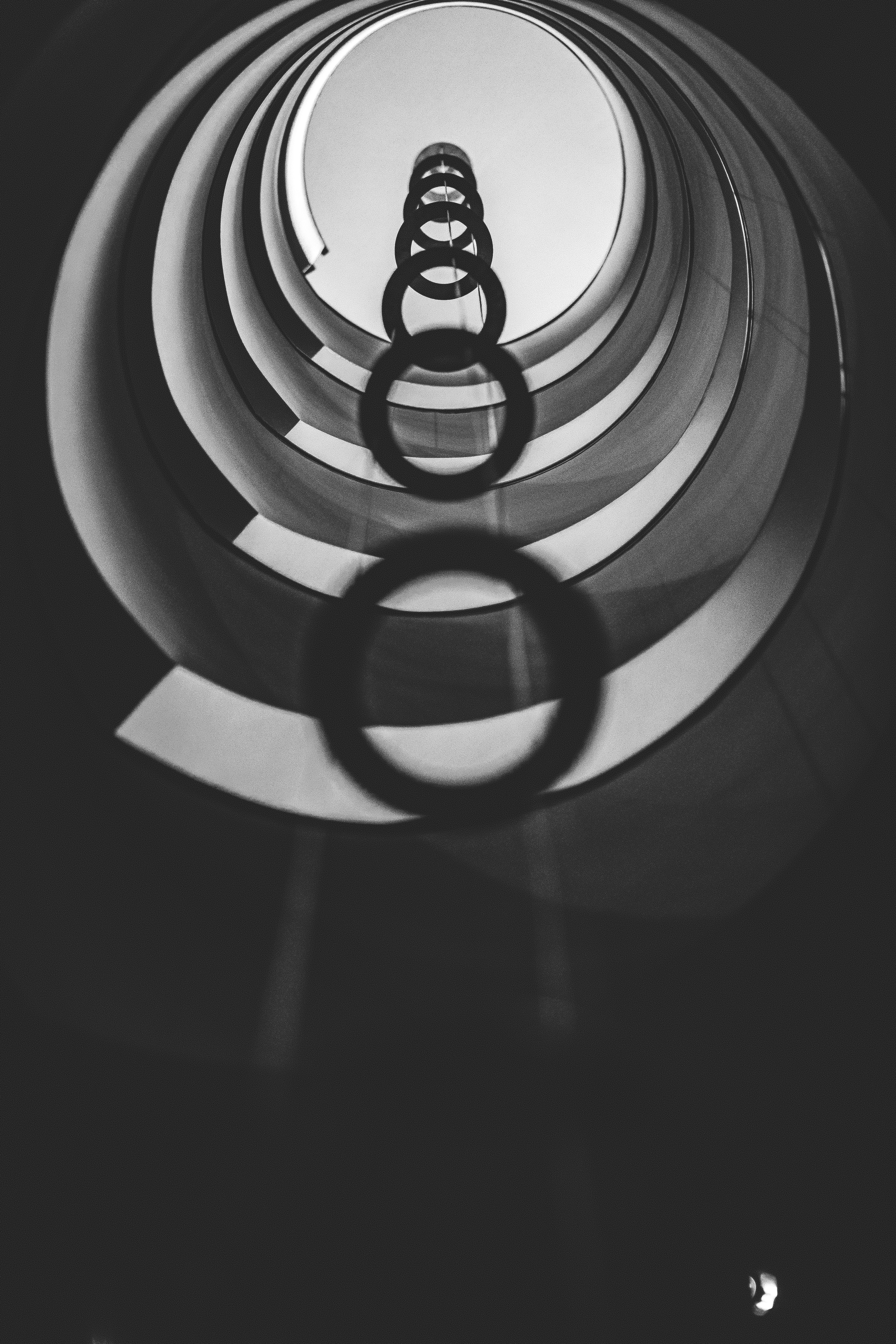 a black and white photo of a circular object