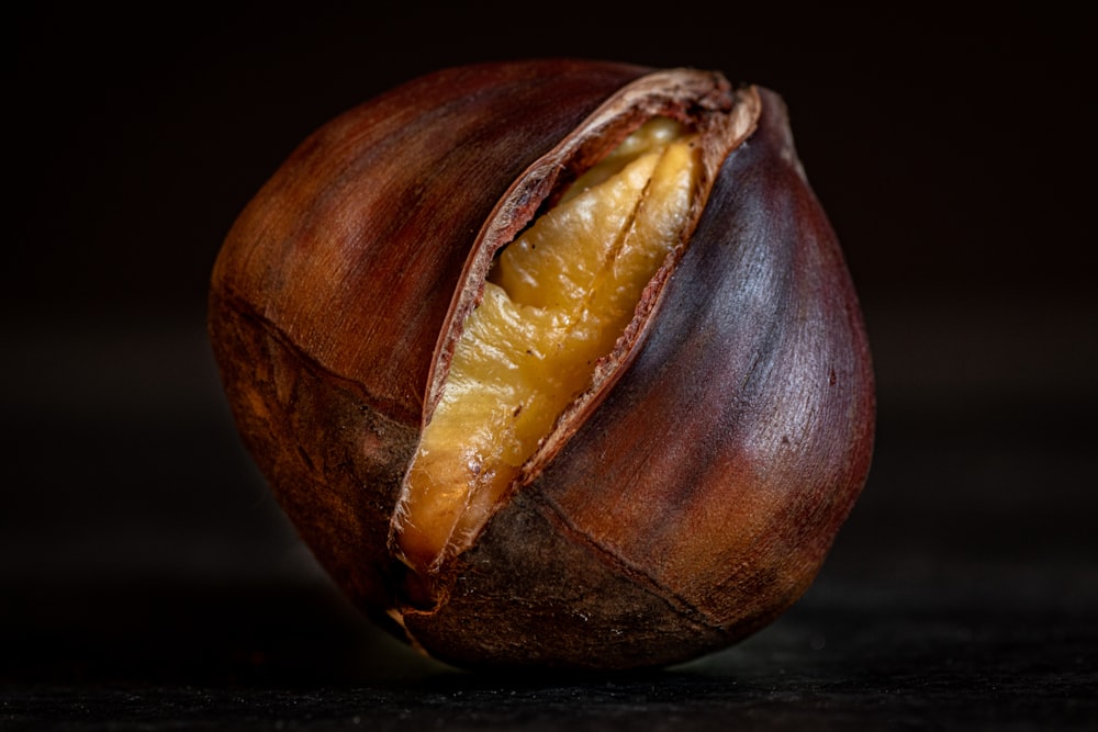 a close up of a nut shell on a table