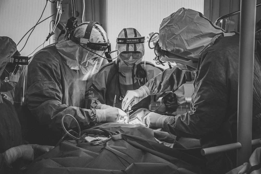 a group of doctors performing surgery in a hospital