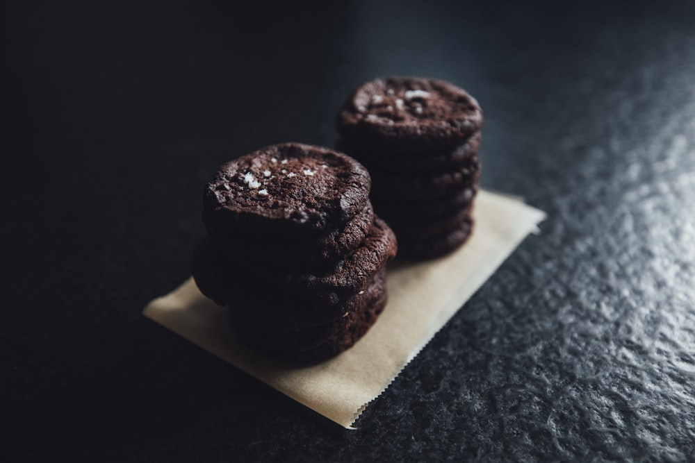 a stack of cookies sitting on top of a piece of paper