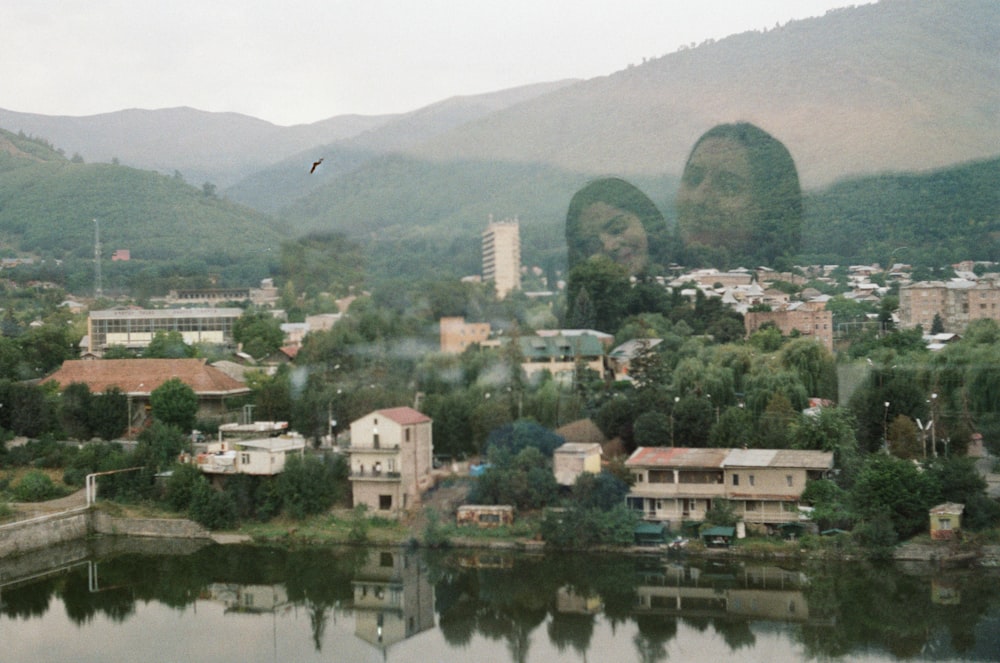 a view of a city with mountains in the background