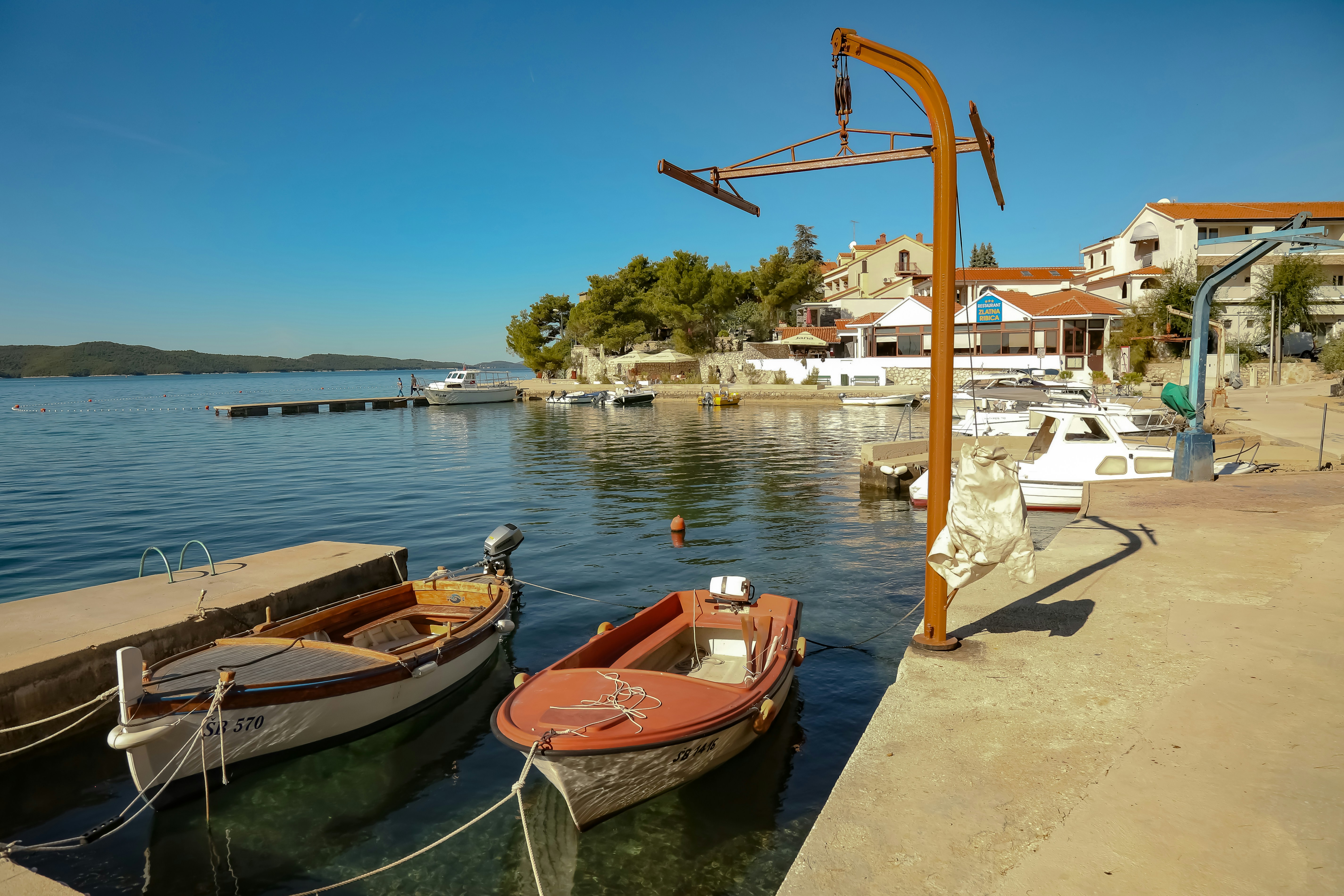 a couple of boats that are sitting in the water