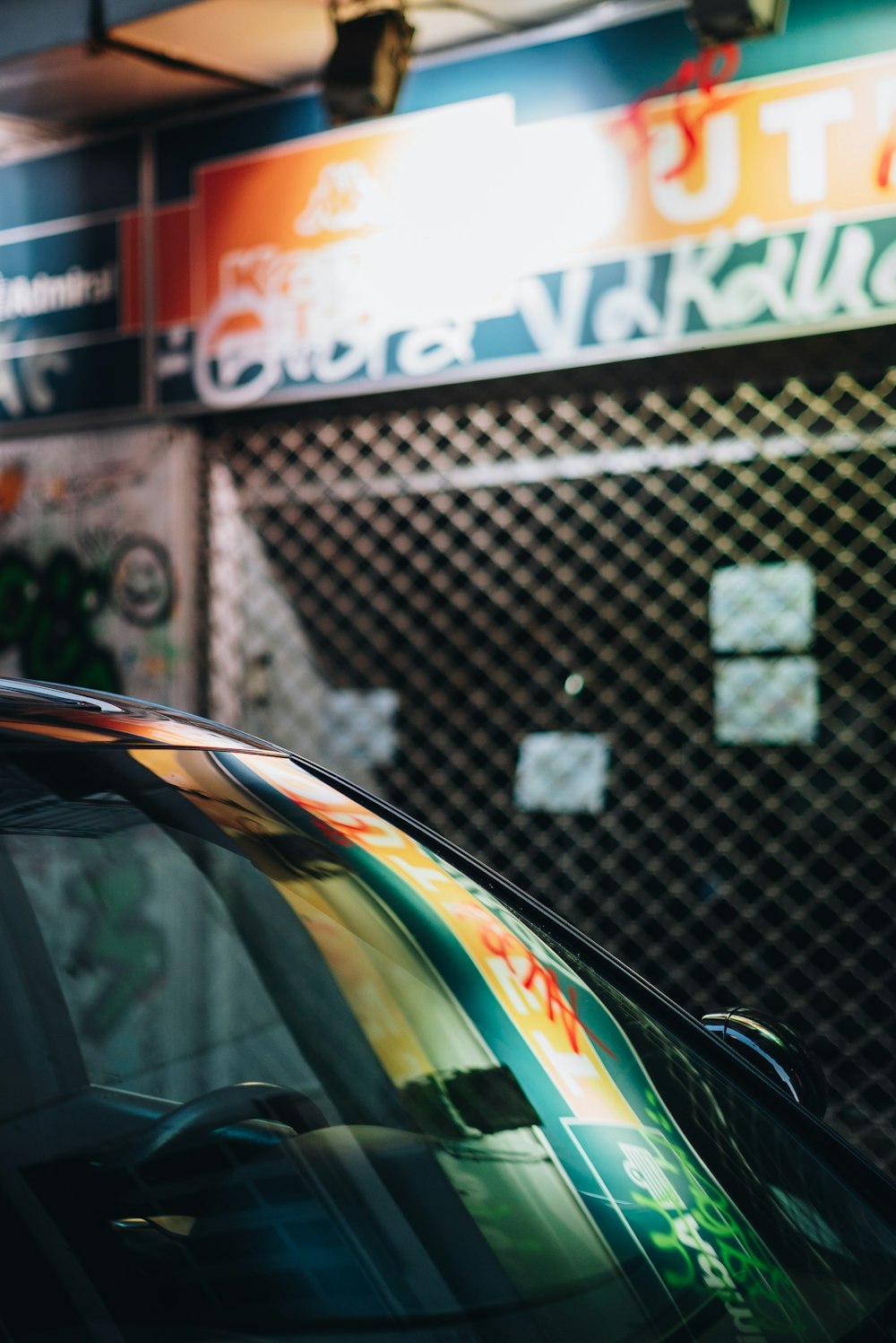 a car is parked in front of a building